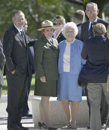 20802967 - former president george h.w. bush and barbara bush posing for camera in front of national world war ii memorial, washington, dc, may 8, 2007
